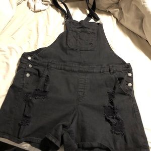 Black ripped over shorts